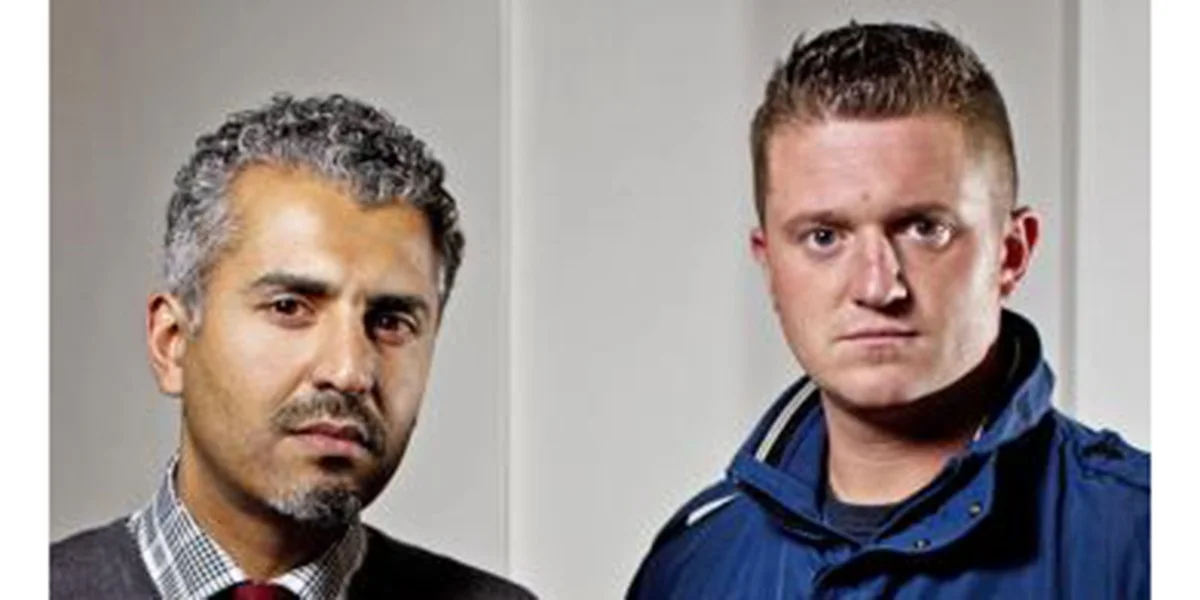 Tommy Robinson and a man in a suit, serious expressions. Is Tommy Robinson a hero?